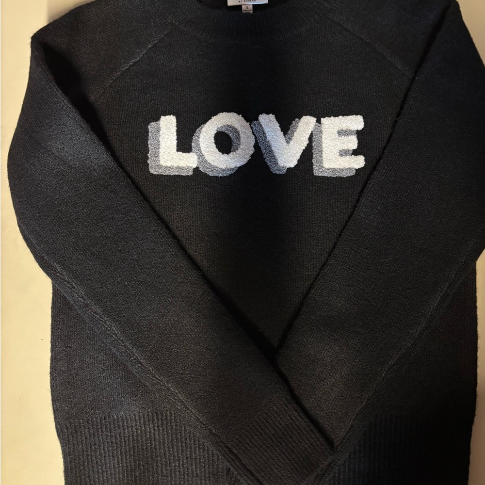 Black Sweater with White 'LOVE' Text